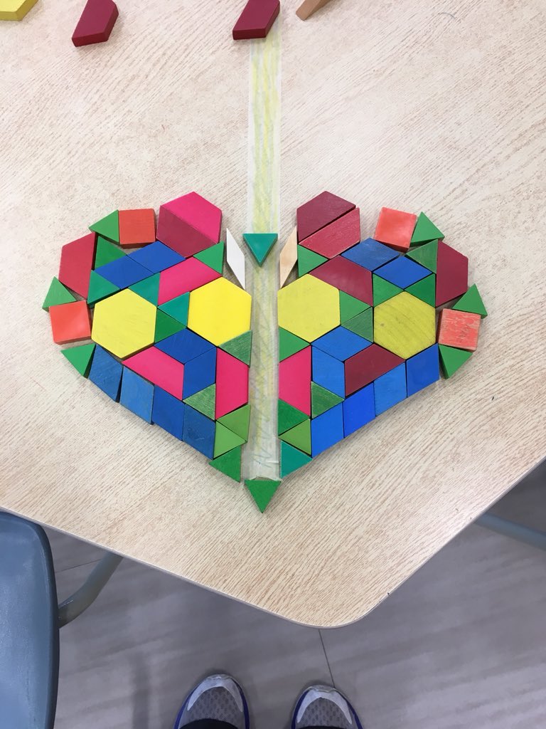 Mpchiarello's tweet photo. Exploring symmetry in kindergarten. Look at that heart!  Taking shape #ADSBmath https://t.co/YlgkQvWXmo