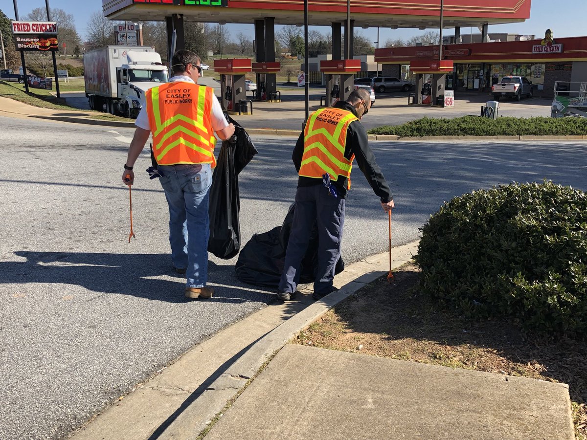 CityofEasleySC's tweet photo. If you happen to see these orange vests around town, some of our employees are helping clean up Pickens County! Today is Pickens County’s #TeamUpandCleanUp Day, which helps combat trash located across the county. Be sure to tag and send us pictures of you doing your part to help! https://t.co/yTf6Hri0ho