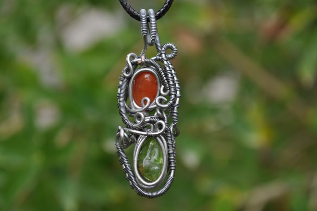 Rawvolutionjwls's tweet image. Find us on Etsy under Rawvolution Jewels or visit the link in our bio to shop our available inventory. 

This Carnelian Agate &amp;amp; Peridot Heady Wire Wrapped Pendant is Wrapped in stainless steal and silver plated copper.

Dimensions: 1.9 inches x .7 inches