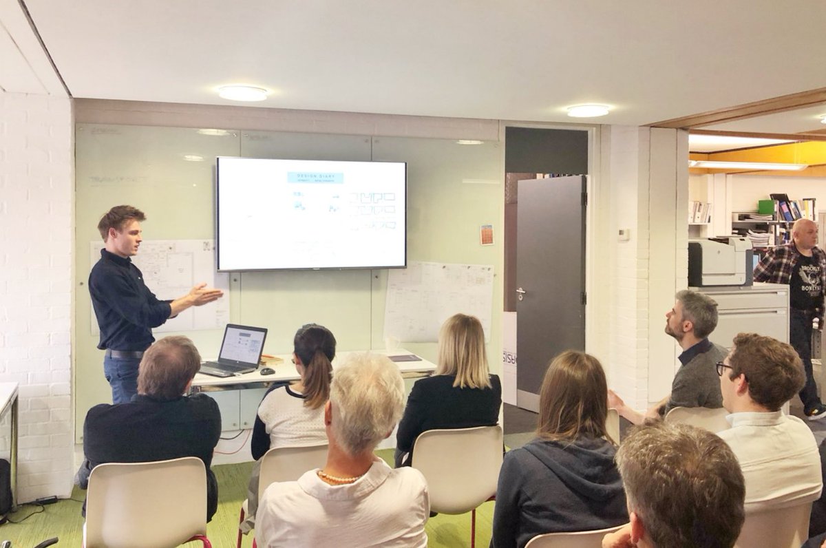 UniofBath's tweet photo. Thanks to @tfoggin for sharing these photos of our @BathArchandCivE students Ralf and Seb, presenting their portfolios today as part of their placement at @RHPartnership. Read more about their placements here: https://t.co/qg1EhlEBKK https://t.co/KsKJs4SxPj