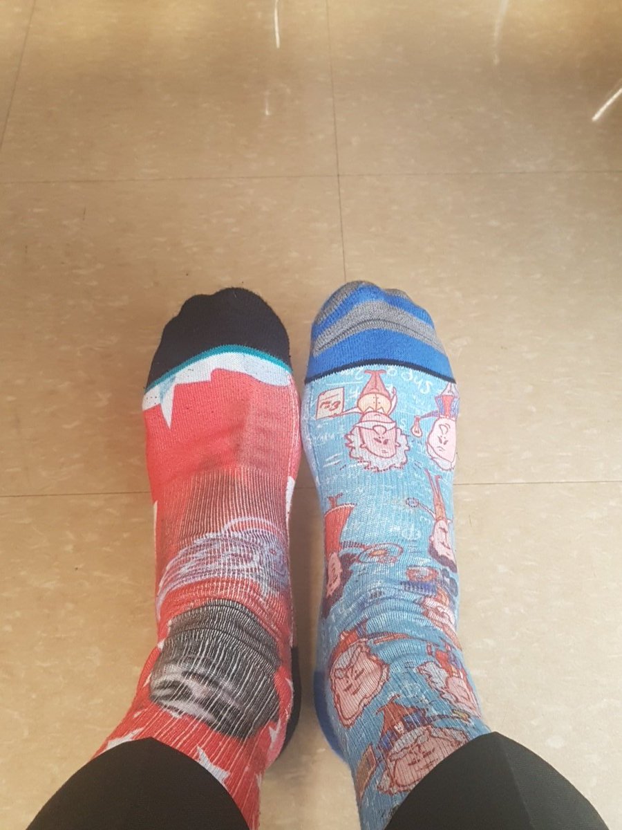 TweetsbyLyons's tweet photo. In support of World Down Syndrome Day, I have some of my best, mismatched socks. Tupac on the left, Einstein on the right.

#WDSD18 
#lcsdtome
#RaidersRule https://t.co/ontH5nDWvo
