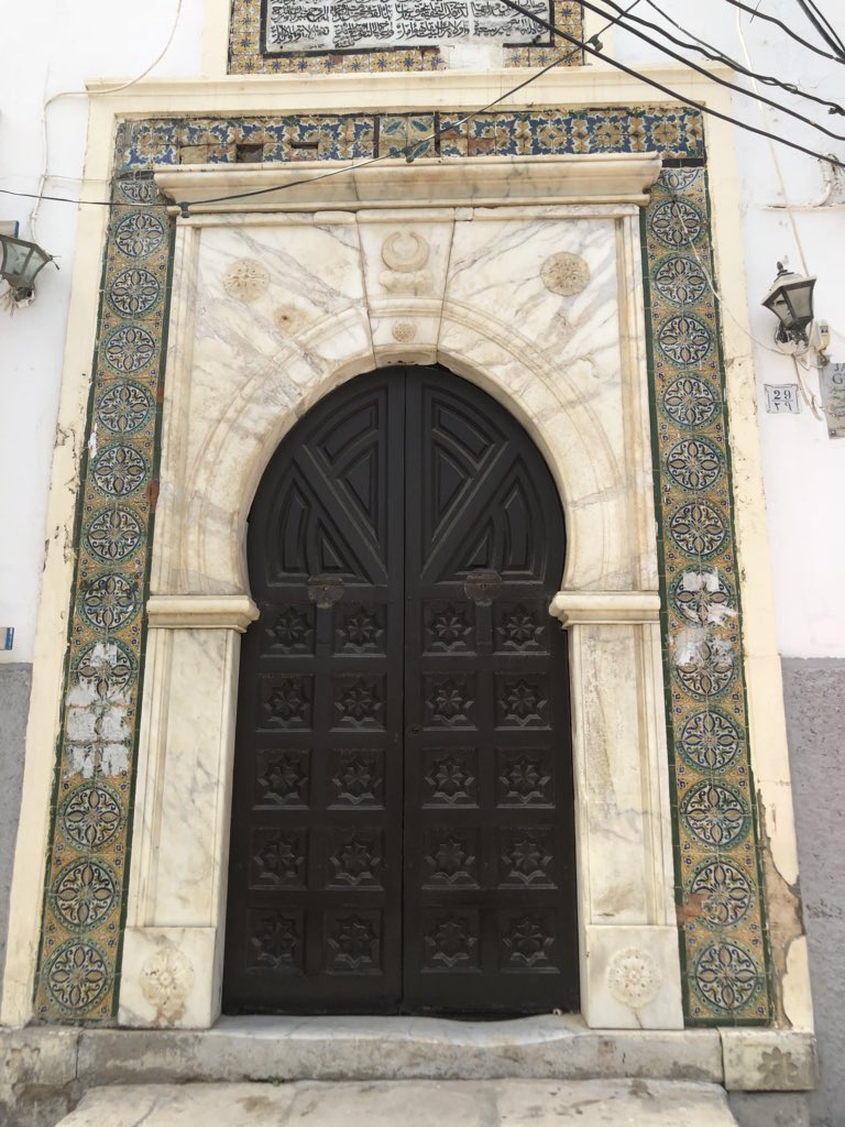 ciarandevane's tweet image. Day of meetings in Tripoli. Some old and new buildings inc the Marcus Aurelius triumphal arch