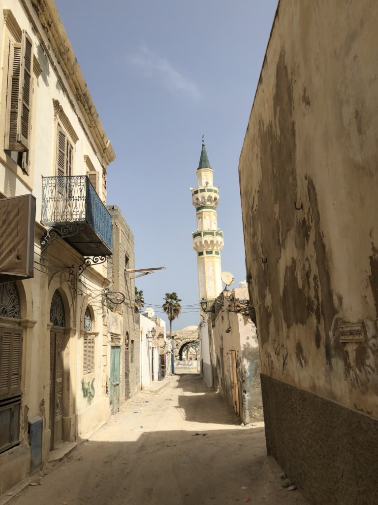 ciarandevane's tweet image. Day of meetings in Tripoli. Some old and new buildings inc the Marcus Aurelius triumphal arch