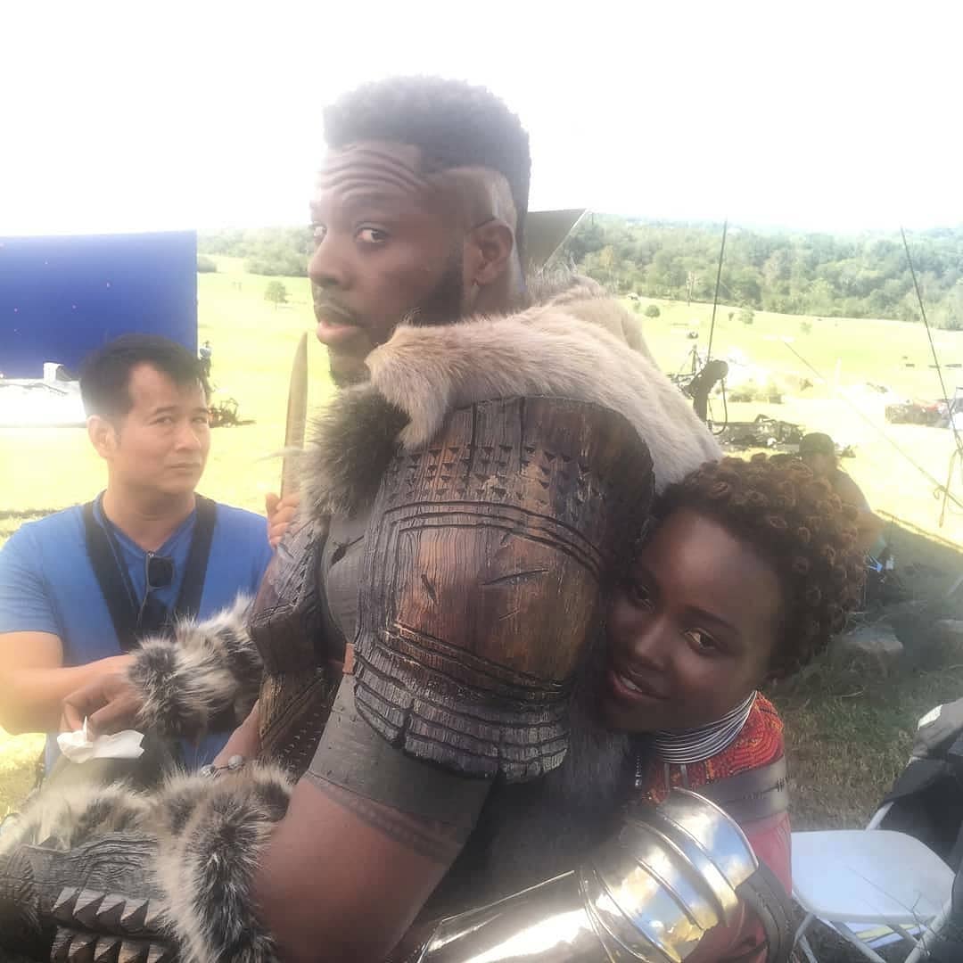 Lupita_Nyongo's tweet photo. And who says the Jabari can't be cuddled! #BlackPanther breaking records and sitting pretty! #Mbaku @Winston_Duke #BTS repost @makeupbytym https://t.co/l48vp19UeH