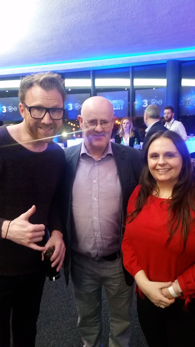 PSNeasain's tweet photo. We're delighted to hear that the fantastic @thejasonbyrne would have chosen @FitKidsFitTeens as his golden buzzer! Dylan's Yr Head &amp; English teacher managed to get a photo with him at the Semi Finals on Monday as they knew he had good taste 😉! VOTE FKFT on Sat. @GotTalentIRL https://t.co/o53uNUEwLJ