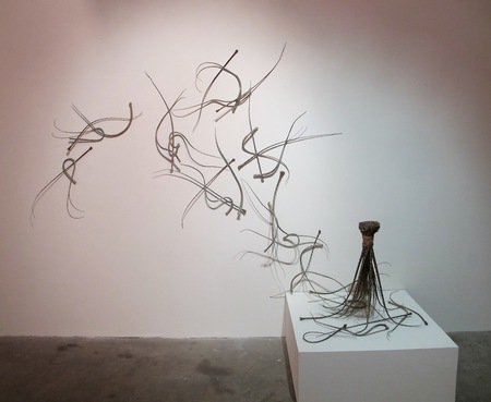 these pieces from adejoke tugbiyele's 'grassroots' show look like there's a wind going through them