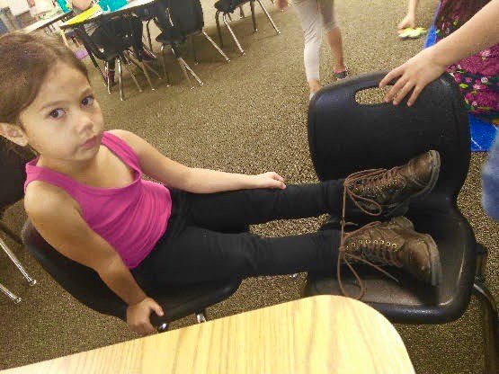 I always marvel at the kinds of situations Kindergarteners find themselves in! After asking her a couple of times how THIS happened and getting the same quizzical look and " I don't know", I suppressed my laughter and just helped the poor girl..