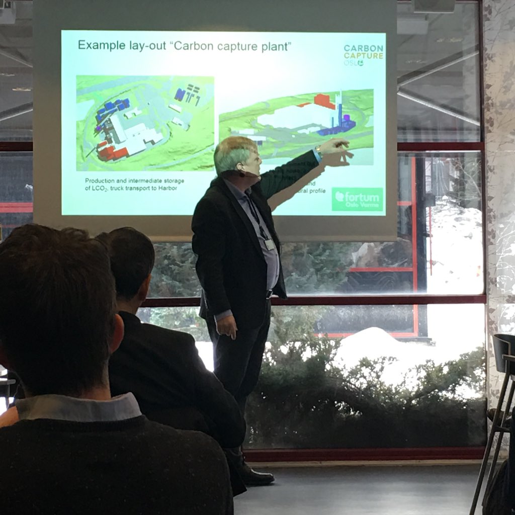 Torund's tweet photo. We are on our way with the @GlobalCCS #CCS Safari. First stop @FortumNorge Oslo Varme. @PalMikkelsen showing the layout plans of the possible future carbon capture plant. @Gassnova @SINTEF @NCCS_FME https://t.co/f6hFhe6tII