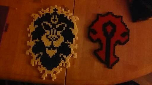 AprilFrench40's tweet image. Heres for other @WOW_news here are the emblems.  on the left, alliance, the good guys (blech) and on the right, the horde!  woohoo!  well no matter which you prefer these are only 10$ for a 1 ft tall emblem.
