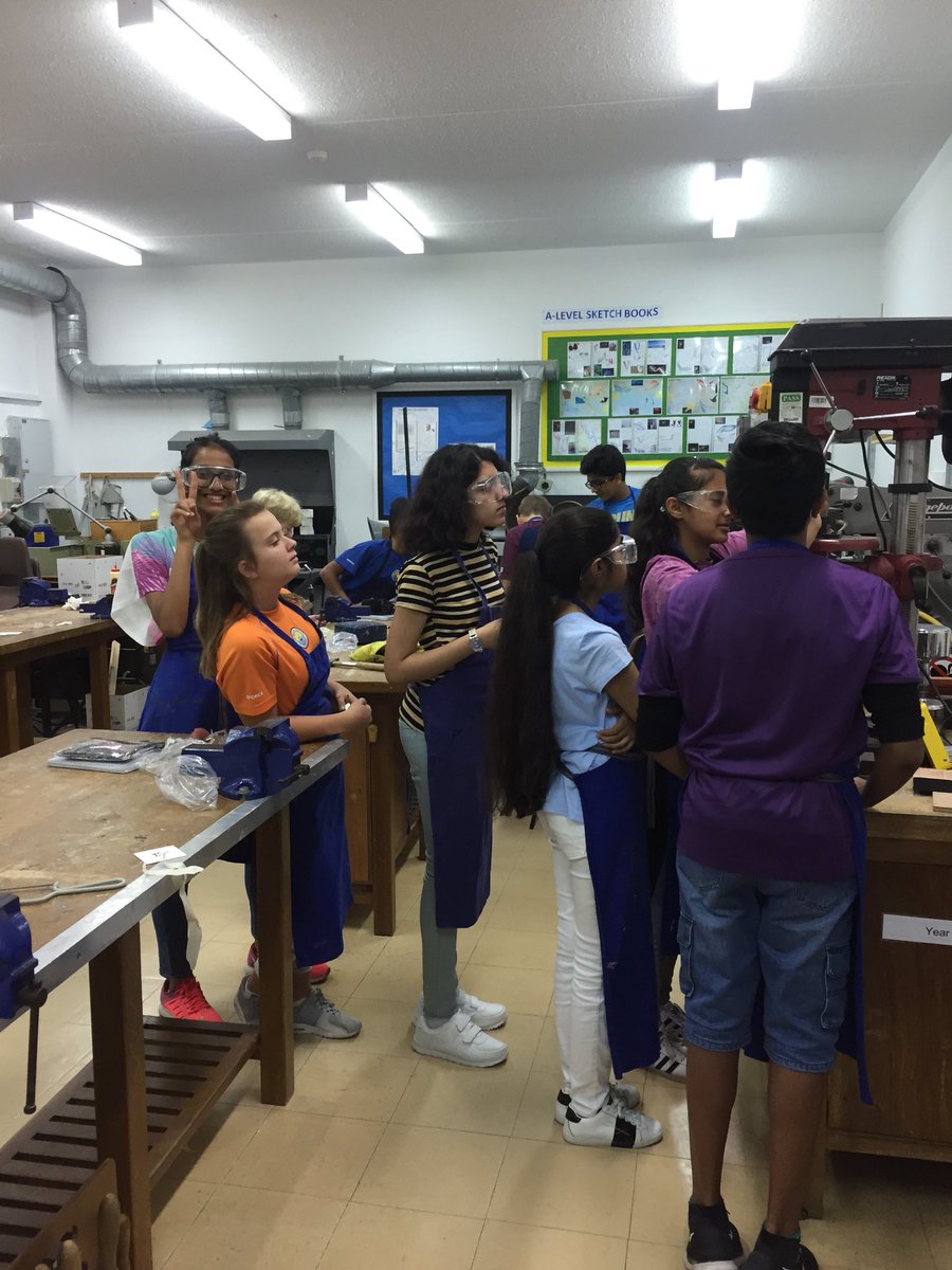 Year 8 students learning the concept of queuing to use the Pillar Drill.