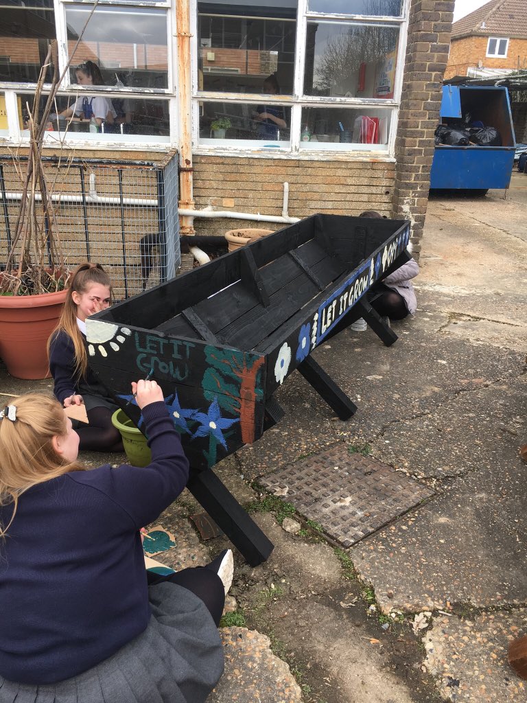 MrEyre's tweet photo. The @TBHAcademy Garden project is going from strength to strength, students decorating the planters that Mr Kirkby has made! Very proud of the students. Big thank you to @Tesco for their bags of help grant. #TBHA #believeinyourbest #tescobagsofhelp https://t.co/sUFQ5Ohcv5