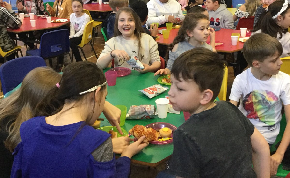 Reward party is well under way,  pizza and cake all round!