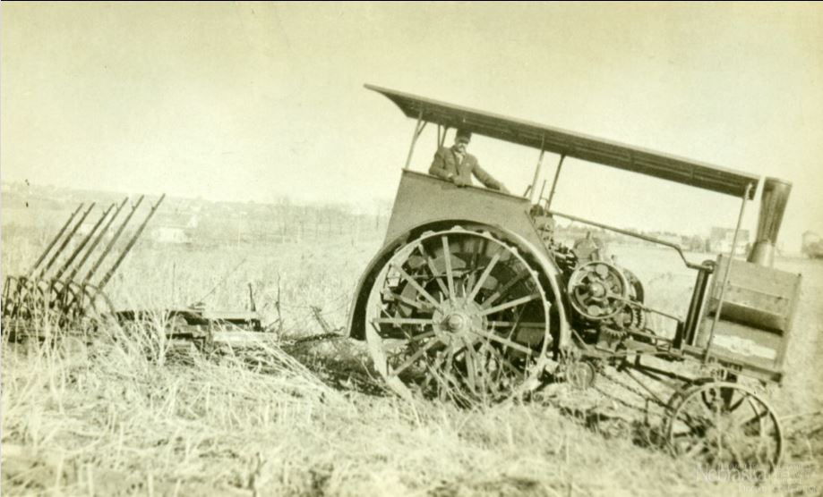 UNLarchives's tweet photo. We're reaching way, way back this #UNLTractorTuesday to look at a Aultman & Taylor #tractor descending a hill in a field with a plow in the 1910s! #TractorTuesday #oldiebutgoodie #antiquetractors @UNL_IANR https://t.co/PHt4eeA5ZK