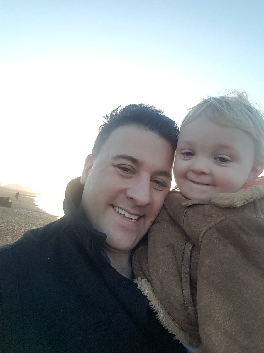 Me and little son at the beach .x