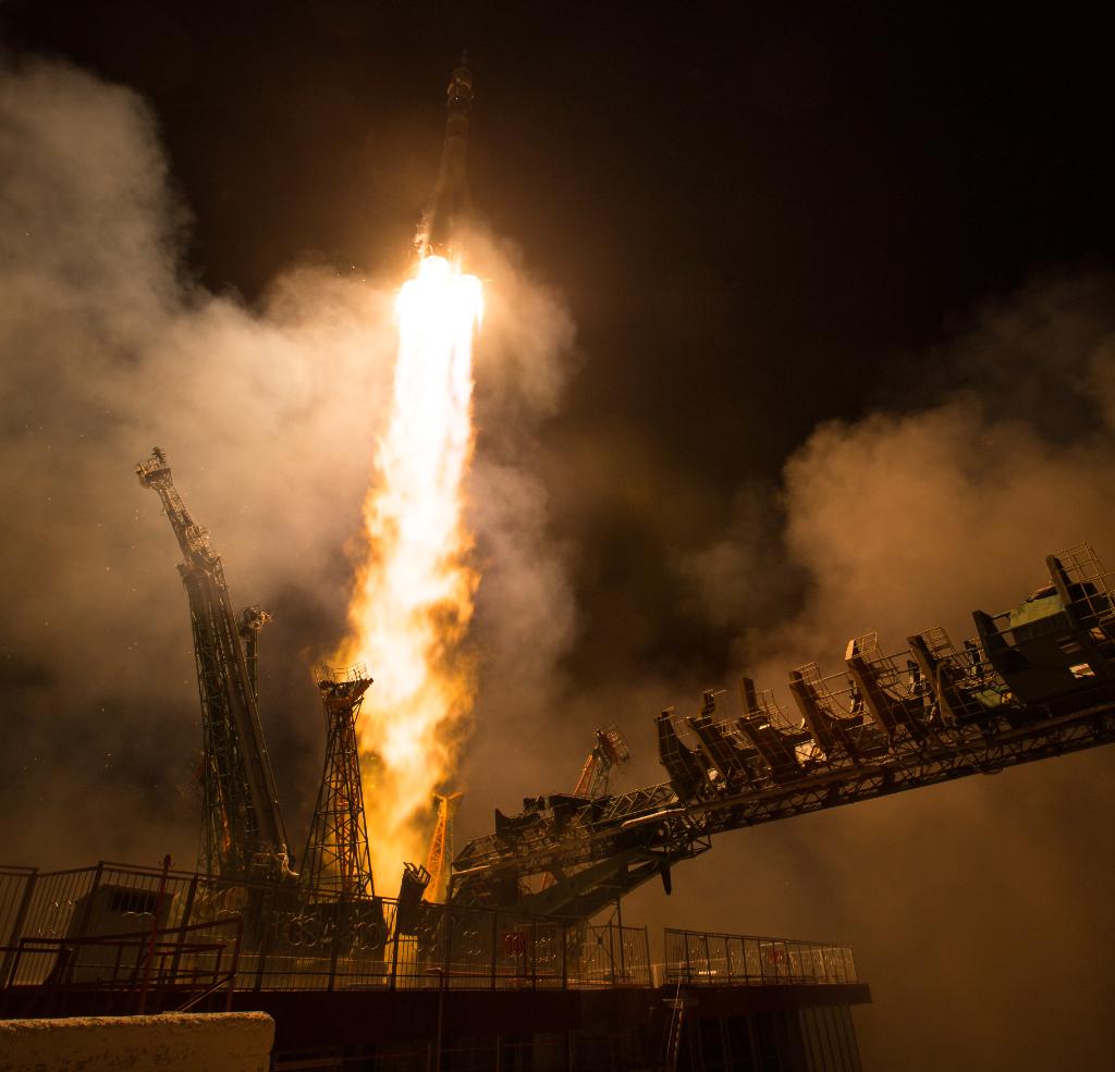 NASA's tweet photo. Tomorrow, the three humans that launched from Earth on Wednesday will arrive at their new home on orbit. Tune in to watch as they dock to the @Space_Station! Coverage begins at 3pm ET. Details: https://t.co/fkT4gkf95Y https://t.co/BKLobF22ce