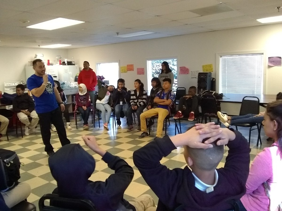 opsthrive's tweet photo. Coach @realjuancangas held a THRIVE session in Charlotte, NC for refugee and immigrant students who attend @ourBRIDGEkids. Students learned the significance of the motto..THRIVE not just survive #youth #empowerment #love #respect #diversity #Education #OPSProud #thrive https://t.co/xX5ELBhZka