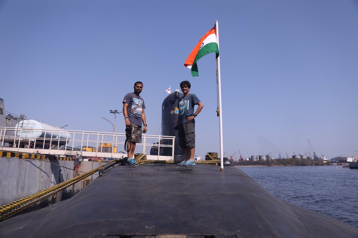 TheNextBendFilm's tweet photo. Standing tall with proud,next to our national flag and on a powerful mean machine #Indiannavy #submrines #goldeneolphins @DiscoveryIN https://t.co/qVBpFwG9Wq