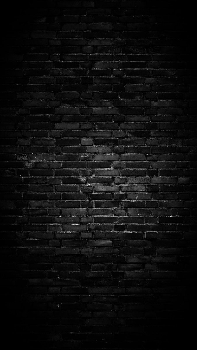 Premium AI Image | Photo black brick wall textured white texture background  AI Generated Image