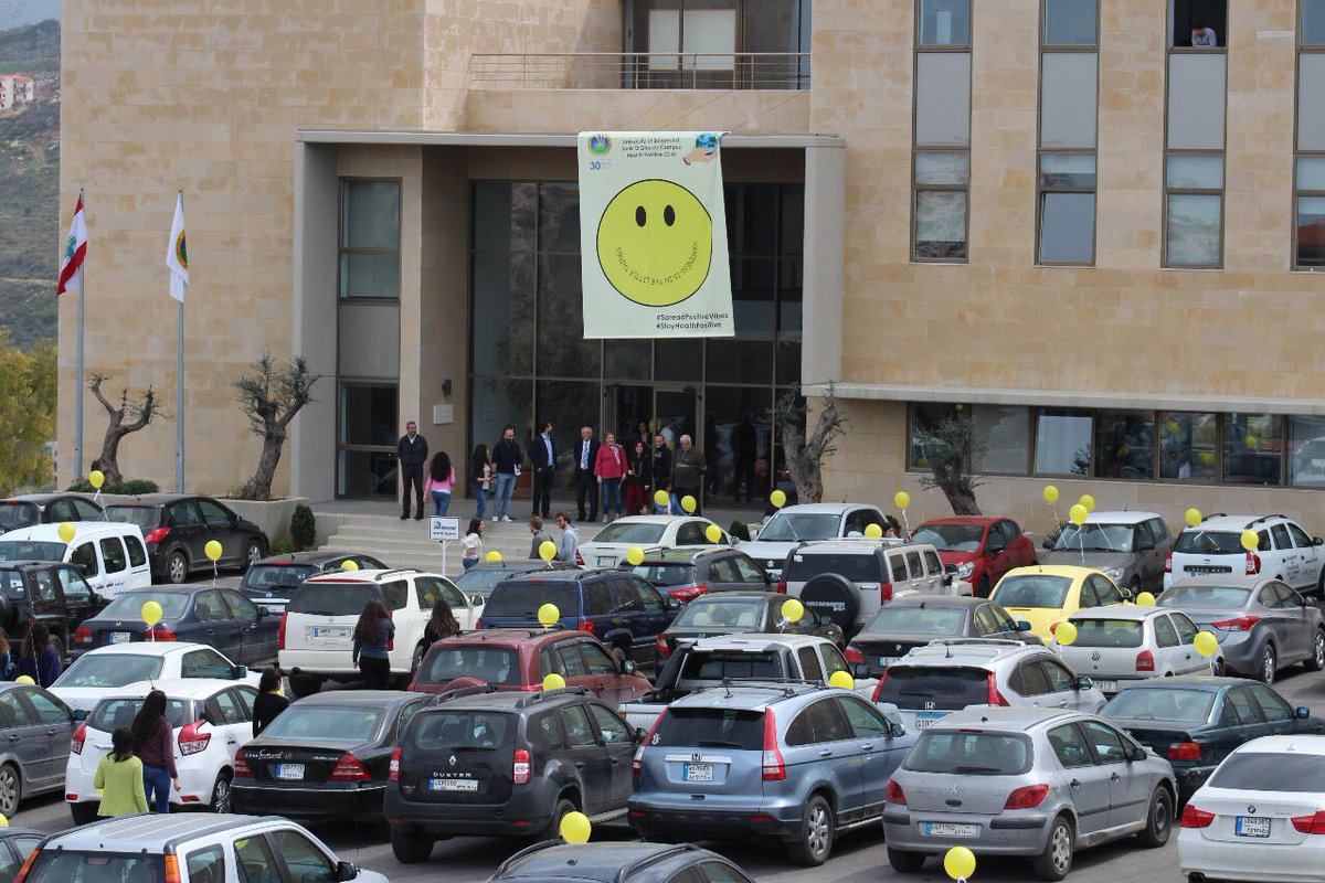 uobfhs's tweet photo. Smile! The “Health Positive” club organised a happiness day activity on March 15, spreading positivity on Souk El Gharb campus through yellow balloons and quotes on happiness. 😀 https://t.co/fYVQOMYQco