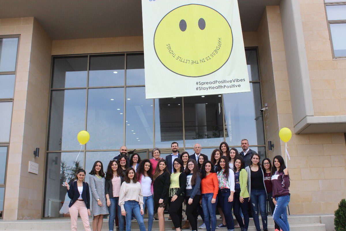uobfhs's tweet photo. Smile! The “Health Positive” club organised a happiness day activity on March 15, spreading positivity on Souk El Gharb campus through yellow balloons and quotes on happiness. 😀 https://t.co/fYVQOMYQco