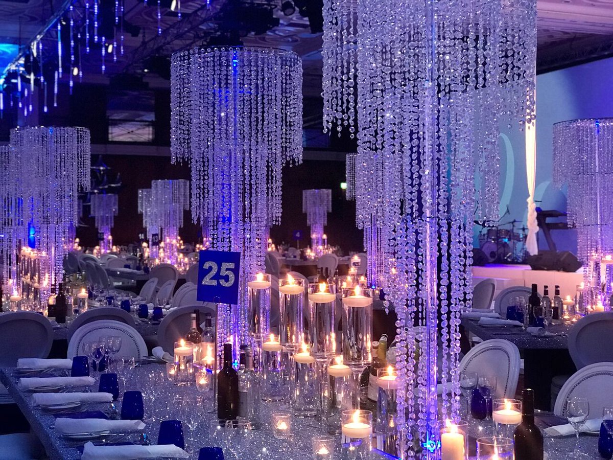 Simple yet effective #event #decor... these #chandeliers create the perfect setting for a chic #corporate #party. View more tabledressers.com #Eventplanners #Eventprofs #EventManager