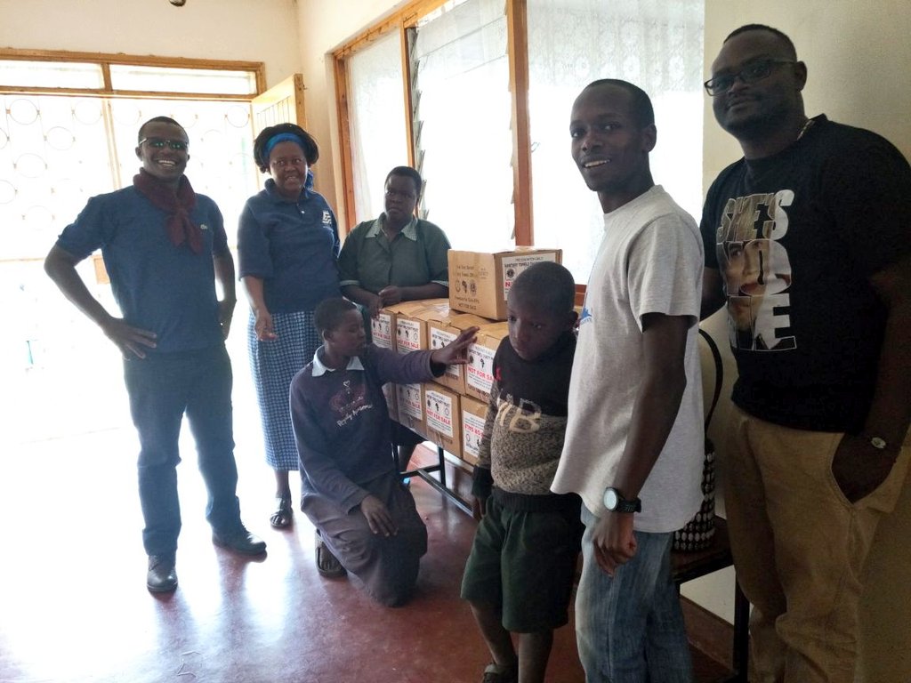 RCNC_ROTARACT's tweet photo. HPads Distribution at the Eldoret Special School. Fun Times #Rotaract50 #WorldRotaractWeek #rcnc40 https://t.co/EIlzJkfKPk