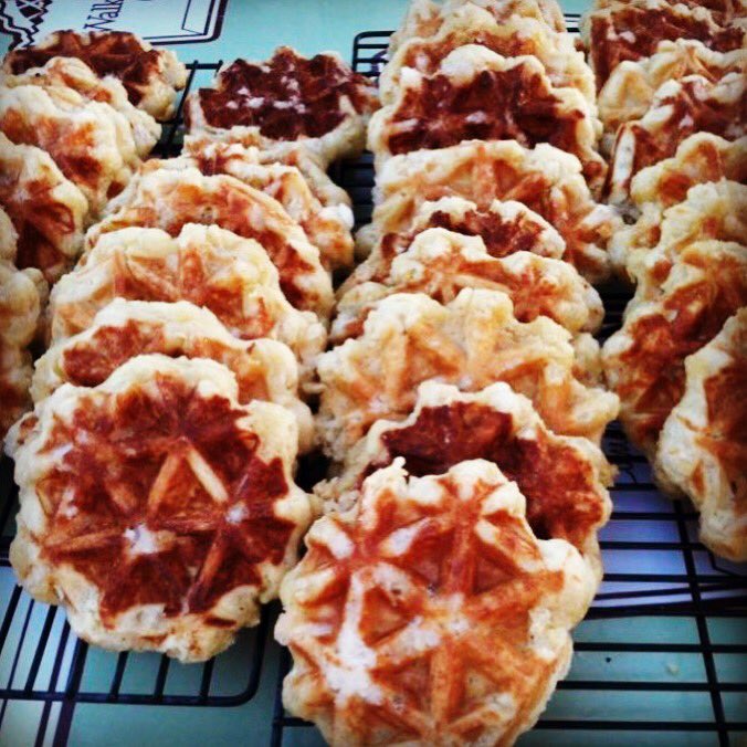 Belgian waffles on deck! topping ‘em with cheddar grits, bourbon maple syrup, and breakfast sausage