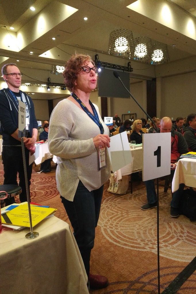 OSSTFtoronto's tweet photo. #OSSTF Toronto President @ldw39 speaks to supporting @Fix_Our_Schools and about the Ontario Provincial election all-candidate pledge campaign seeking support of a legislated Standard of Good Repair for schools in Ontario at #AMPA99 #AMPA2018 #AMPA18 https://t.co/rQugwWWW76