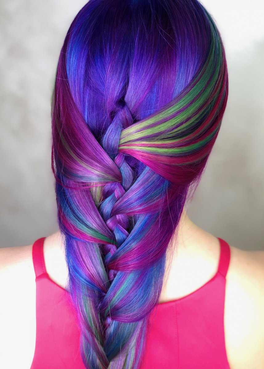 Platform Artist Cynthia Diersen was knot kidding around with this look inspired by the Northern Lights! #farouksystems #chihaircare #haircare #vividhair #haircolorist