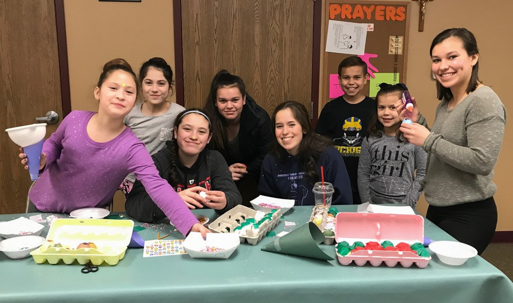 Latina League making cascarones with the dancers/music students.