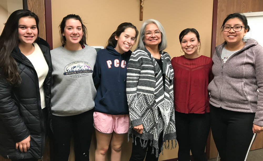 Learning about DACA with a with lawyer Vicky Arteaga.