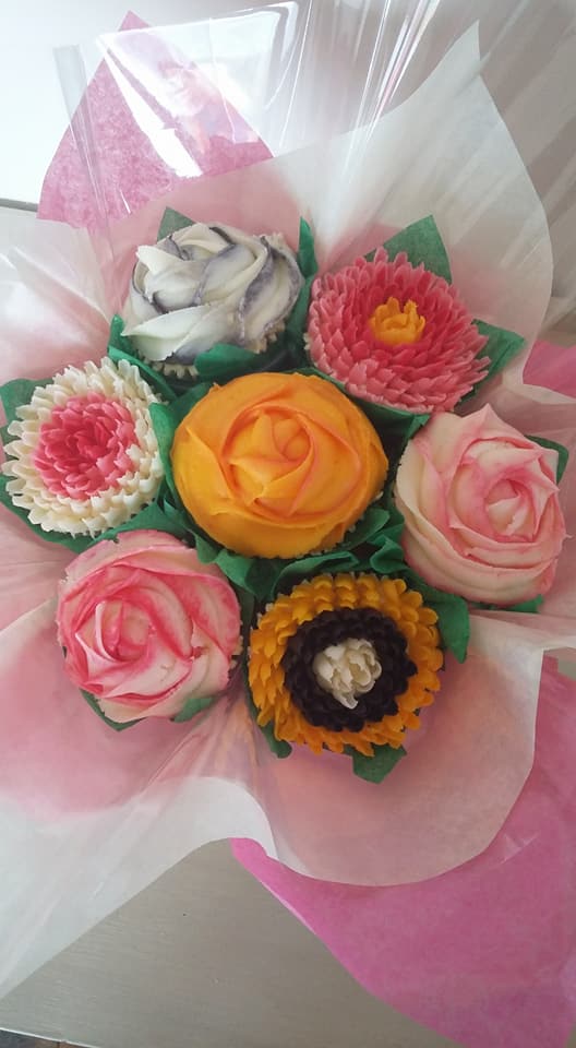 BakedByB_Devon's tweet photo. It was a busy Mother's Day. Lots of #cupcakebouquets #cupcakes #delicious #devon #bakedbyb https://t.co/5mkTRCcdVR