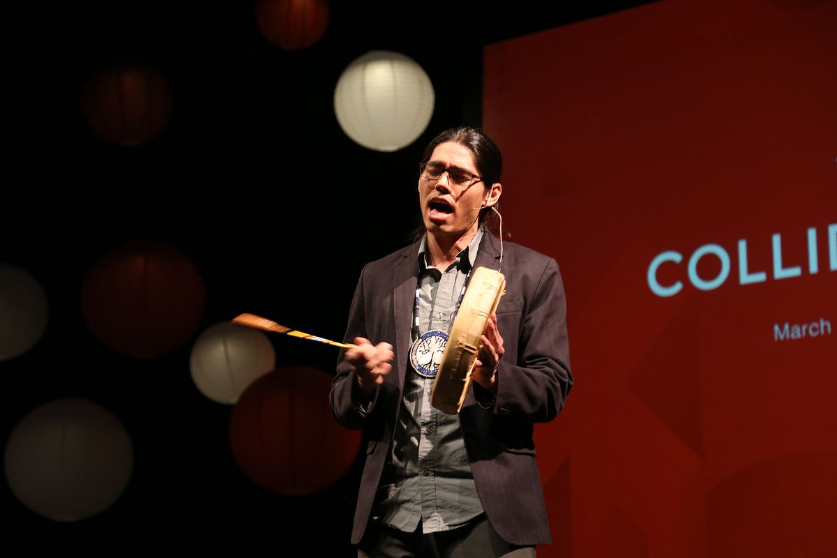 WesternU's tweet photo. Host Erik Mandawe closes #TEDxWesternU 2018 with song and drum and a challenge to never be afraid to question in all of our #CollidingWorlds. https://t.co/O3rCPR5o58