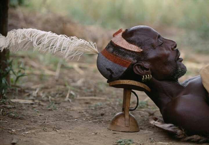 The painted hair buns of Karo men symbolize their courage and bravery, and often indicate that they have killed a dangerous wild animal or enemy.