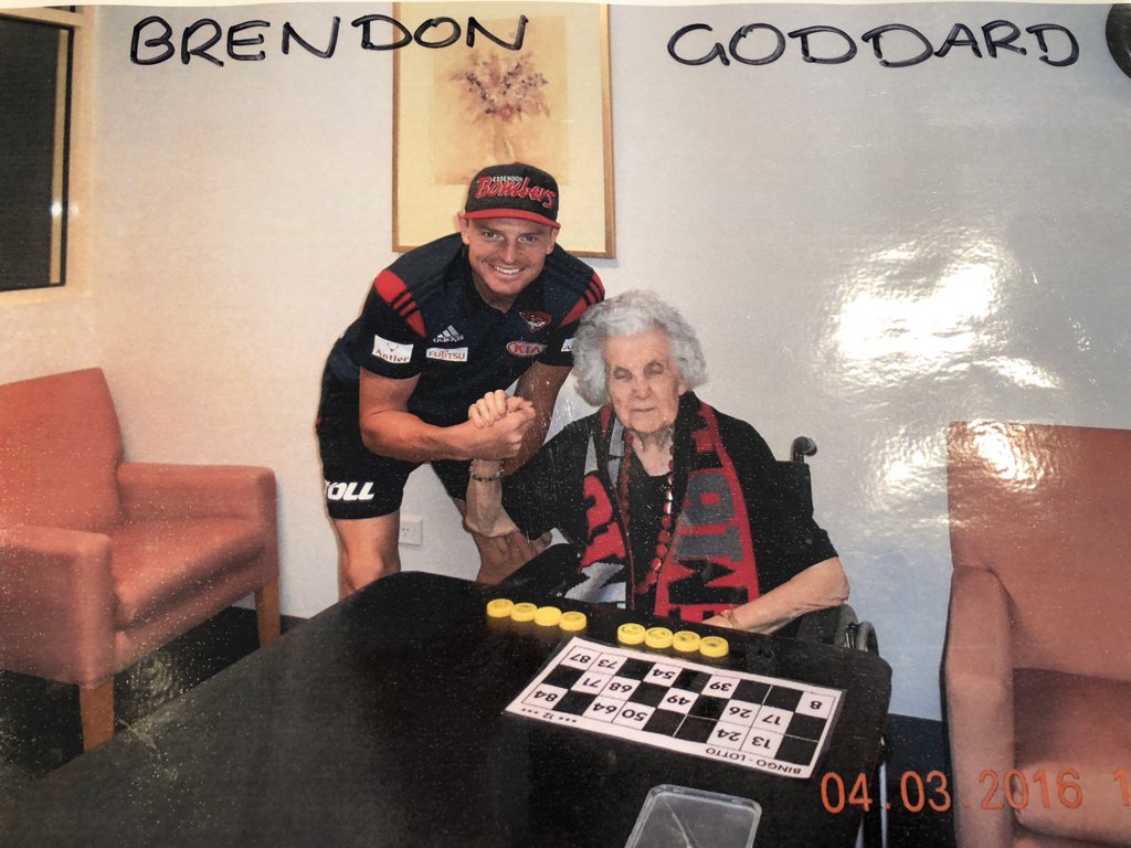 c_wato's tweet photo. My Nana sadly passed away today, 89 years young and proudly supported @EssendonFC all her life. @BrendonGoddard9 and @zachmerrett07 brought her great happiness when they visited her home and their photos have been proudly on her wall ever since. She will be barracking from above! https://t.co/wre9rgIuW5