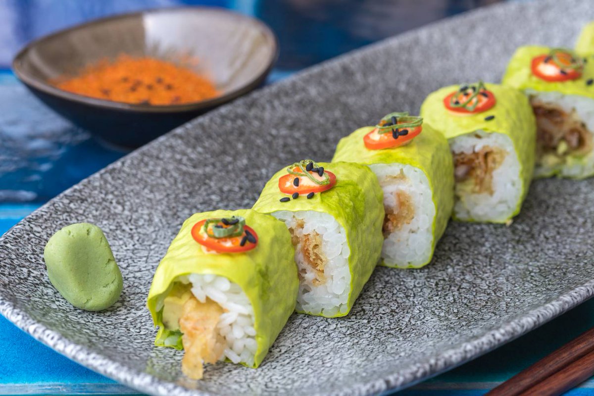 Let the weekend vibes roll 🍥 with our Soft Shell Crab Mamenori Roll. #TrilogyAsianBistro