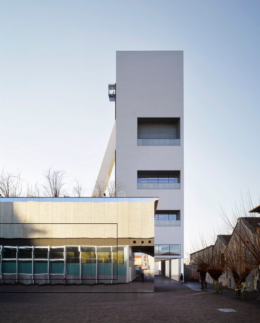 halebole's tweet photo. OMA adds white concrete gallery tower to Fondazione Prada in Milan https://t.co/yOBMfZ4L6m https://t.co/IkR1XlzxSg