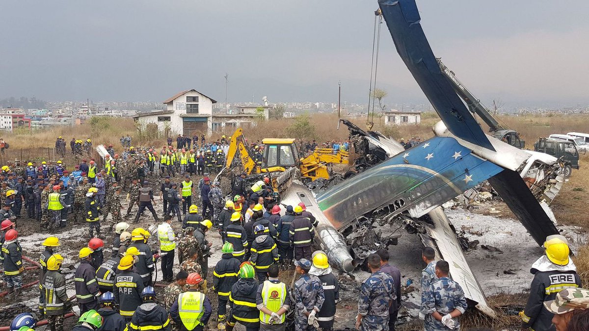 latimes's tweet photo. Dozens killed after plane crashes, catches fire at Kathmandu airport https://t.co/sXXPSziFer https://t.co/E7CQInCYRi