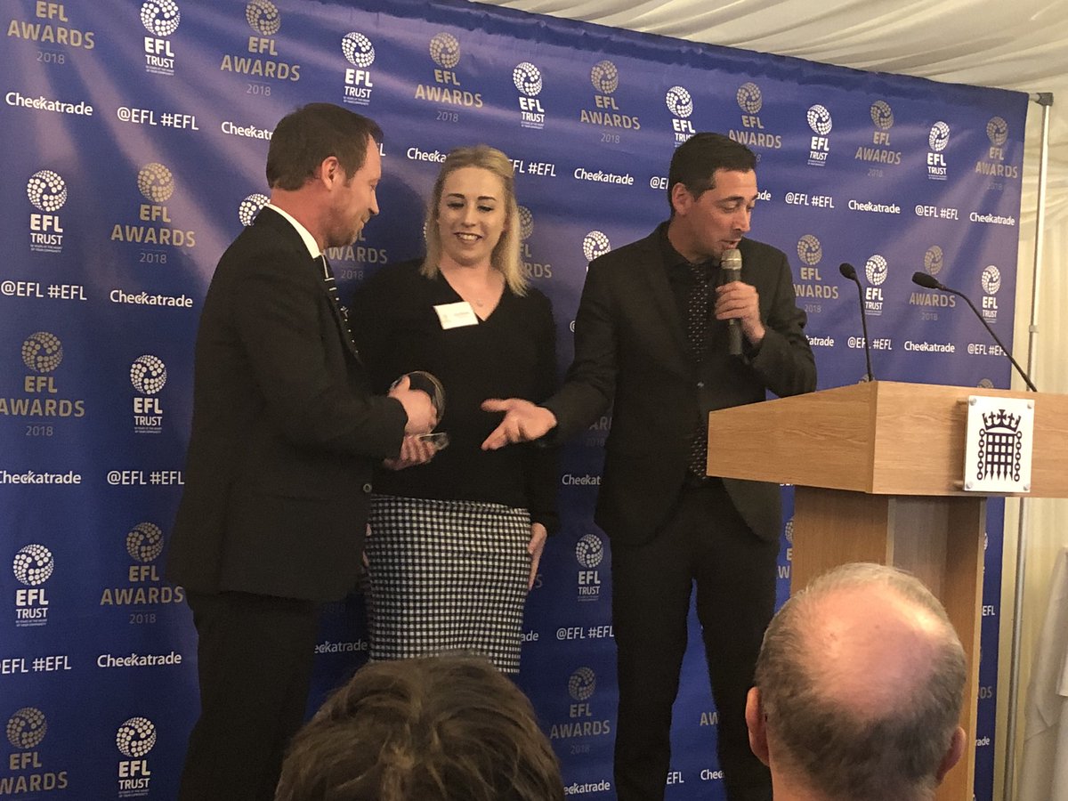 EFL_Community's tweet photo. ⚽️⭐️👏 Paul Newman and Lauren Richards collecting @DCCTOfficial’s @Checkatrade Community Club of the Year award @HouseofCommons. 

#EFLAwards #PowerofSport https://t.co/lfhzWxsYON