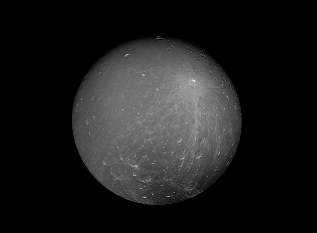 Discovered by astronomer Giovanni Domenico Cassini in 1684, Saturn’s dramatic, icy moon Dione, aptly named for a Titaness in Greek mythology, was eyed by our <a href="/CassiniSaturn/">Cassini</a> spacecraft, the namesake of its founder, before its graceful farewell: go.nasa.gov/2Hu7DZH