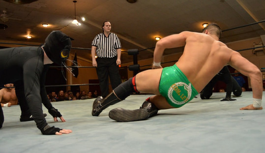 TheWayMaker12's tweet photo. @ExcellencePW thanks for invite but wasn't expecting the feline attack. #badpussycat #beatthecatsup #WWE #nxt #baseballslide #cats #completedebut https://t.co/lPMzQIFLOI
