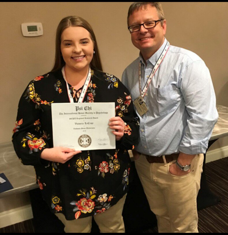 VStateHumServ's tweet image. Congratulations to Valdosta State student Victoria LeCroy (’19) pictured here with her mentor Dr. Josh Rodefer. Victoria won a Psi Chi Research Award at SEPA2018 for her study “Investigation of hiring bias against individuals w/LGBT involvement on resumes." Well done! @rodefer