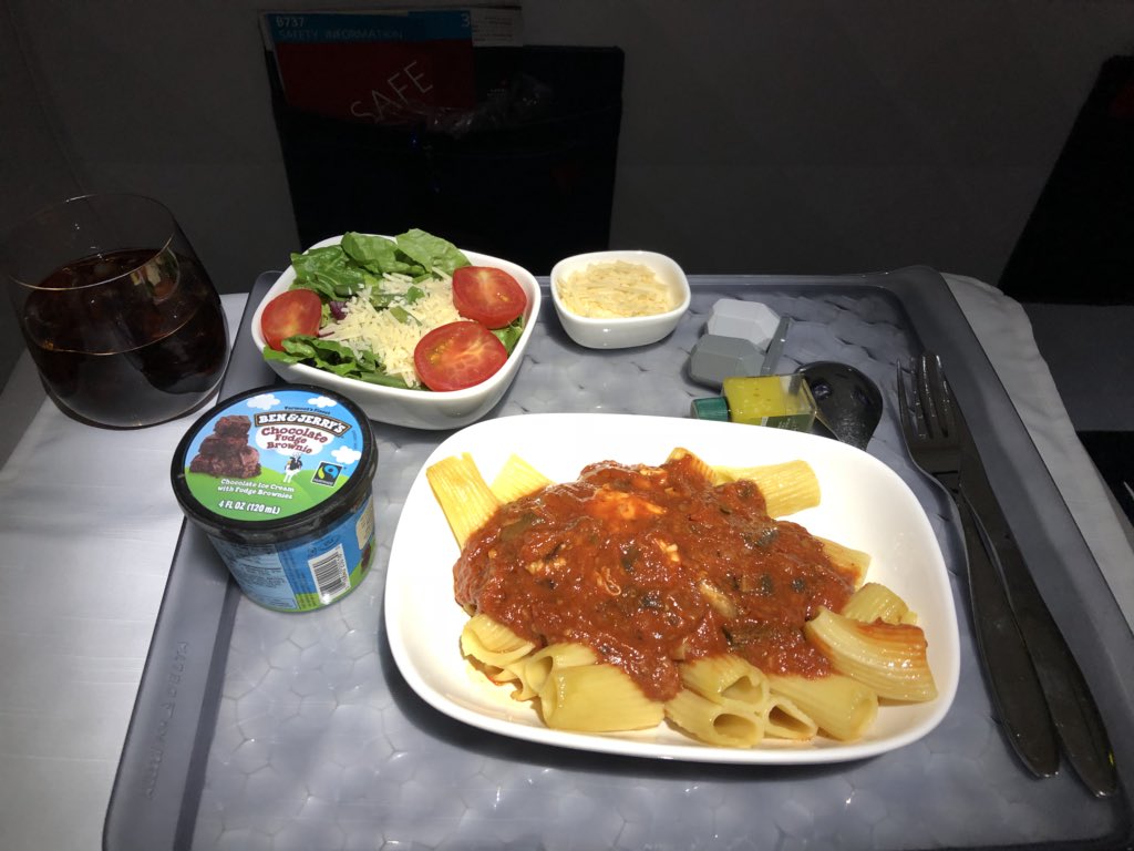 Dinner was served in #FirstClass on @Delta #DL1325 #pasta #yum 🍝😋 Loved the @benandjerrys #ChocolateFudgeBrownie ice cream too! 🤗