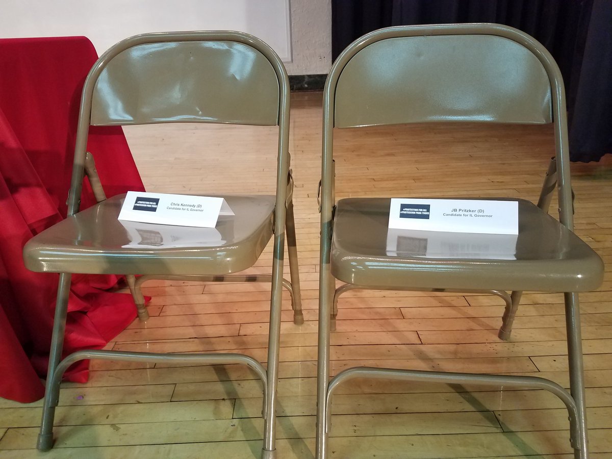 Two empty chairs, one for @JBPritzker and one for @KennedyforIL .    Shame on not showing up.    My undocumented friends and neighbors deserve your time and your respect.  #undocuilgovforum #ProtectionForAll