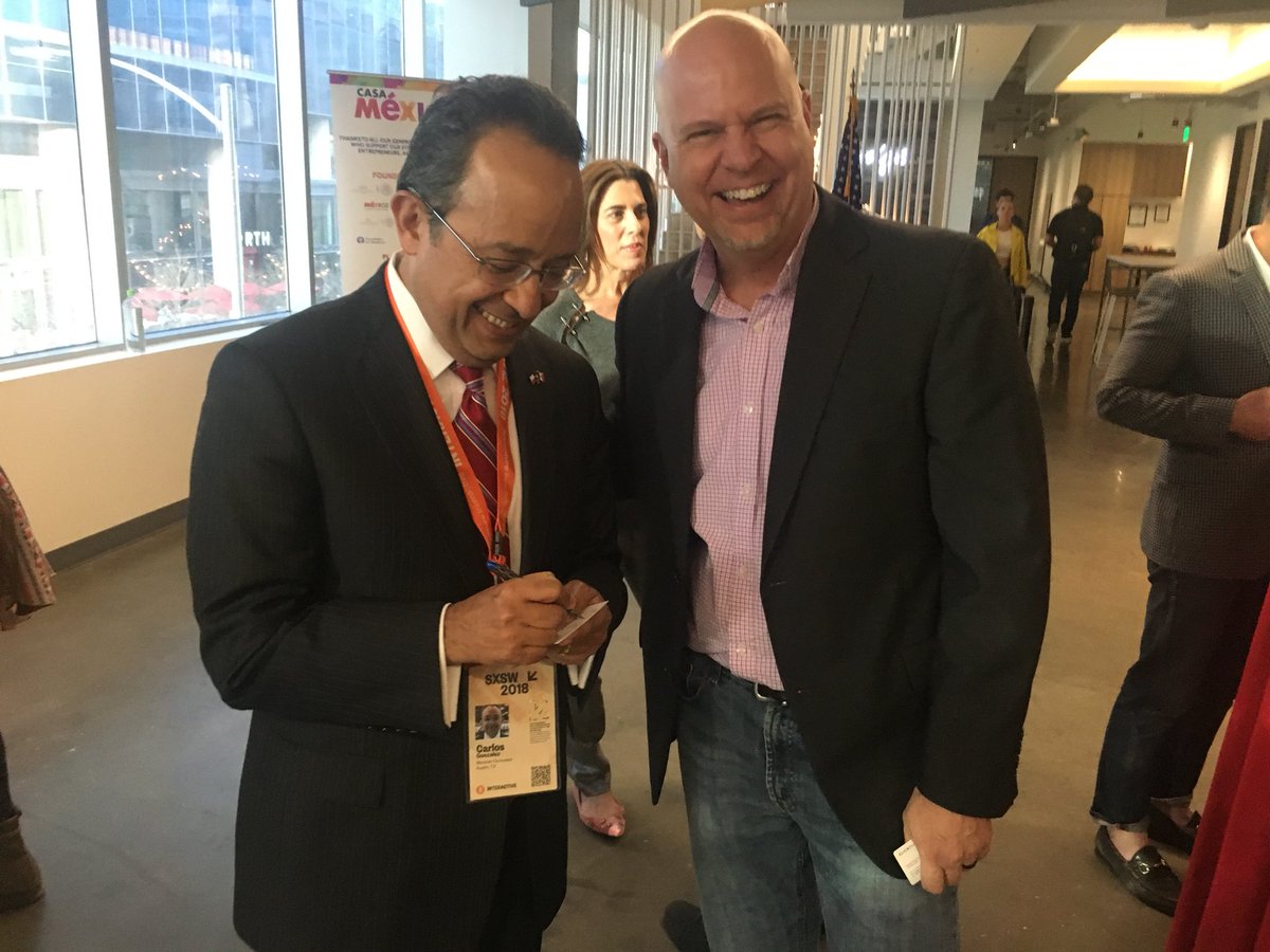 BillBlackstone's tweet image. When you’re a member of @galvanize, you get the REAL VIP treatment. Yes, that’s the @ConsulMexAtn @carlos_glezgtez giving member @Todd_Nevins of @CLICKPlacement his personal cell as Todd moves to Mexico later this month! #SXSW2018 #VIP