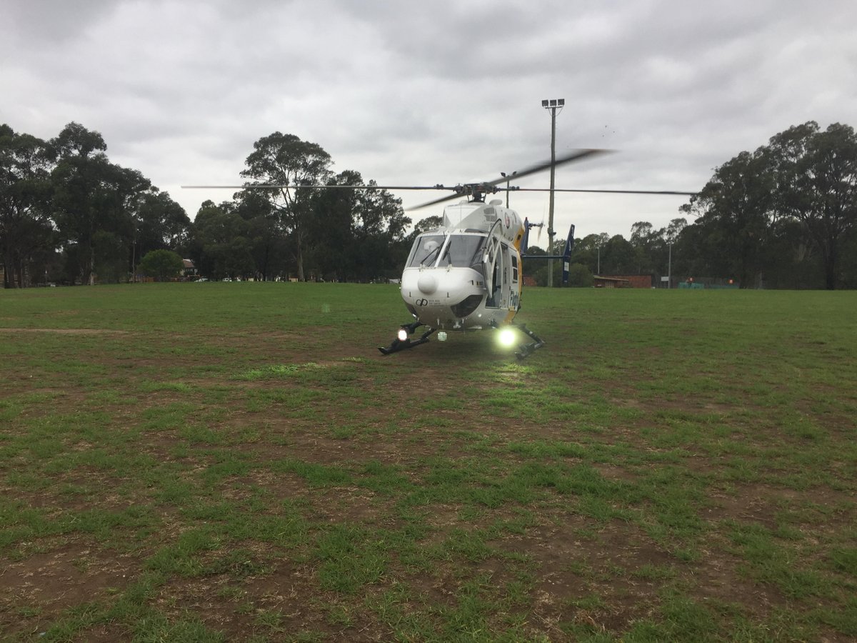 MyCareFlight's tweet photo. At Smithfield: CareFlight medical team take girl, 7, to hospital by road in a critical condition after she was hit by vehicle on busy road. https://t.co/9jNfoFrjST