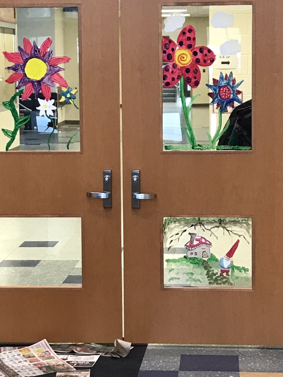 Think Spring!! Art club creating a spring garden in the lobby.