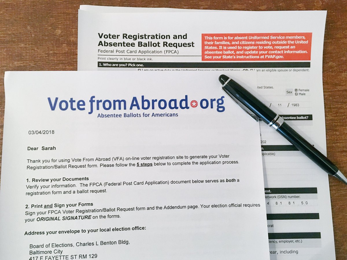 Vote from abroad form & pen