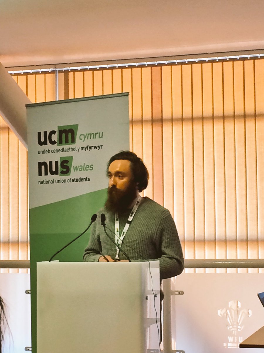KatieBrute's tweet photo. Our current @GlyndwrSU president @Travis_davies doing a superb job in giving his presentation for the position of Deputy President in the @nuswales elections #ElectTheBeard #NUSWConf18 https://t.co/qSfIb6yvut