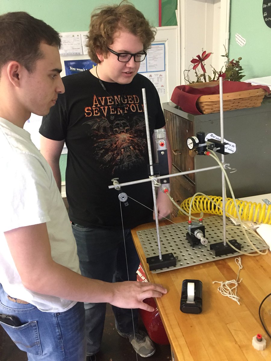 GilmanCityHS's tweet photo. Mitchell and Riley working hard on an air pressure powered pulley system in Mr. Tibbles class. Awesome job boys! It is fully functional! https://t.co/xU8NBcLBuL
